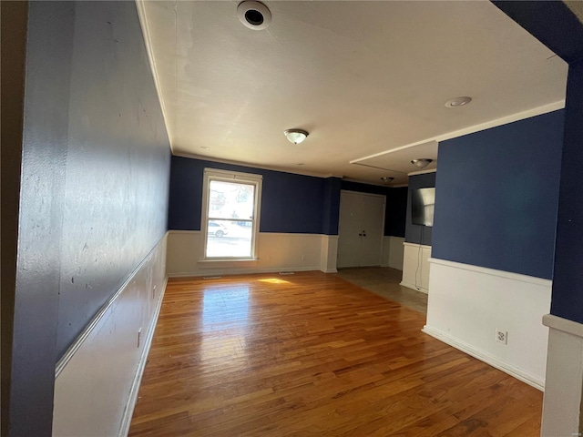 empty room featuring hardwood / wood-style flooring