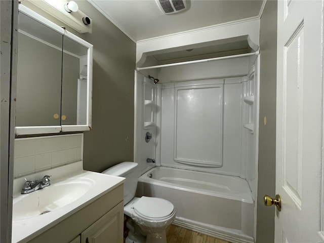 full bathroom with toilet, wood-type flooring, backsplash, vanity, and  shower combination