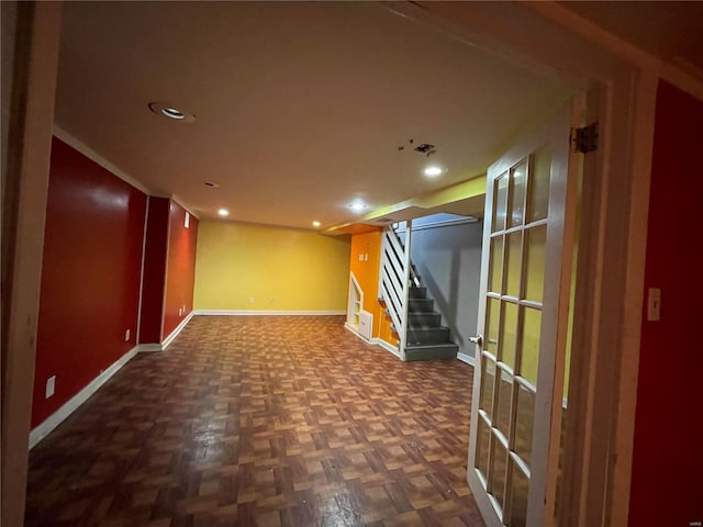 unfurnished room featuring dark parquet flooring