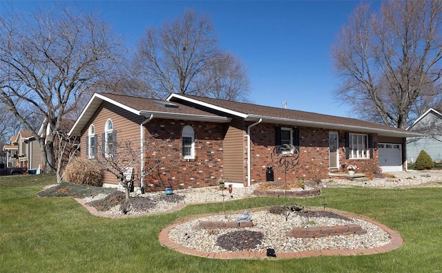 ranch-style home with a garage and a front yard