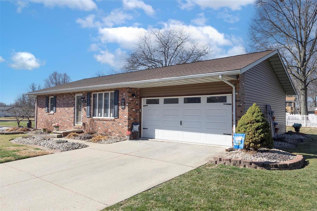 single story home with a garage