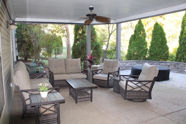 view of patio featuring ceiling fan and outdoor lounge area