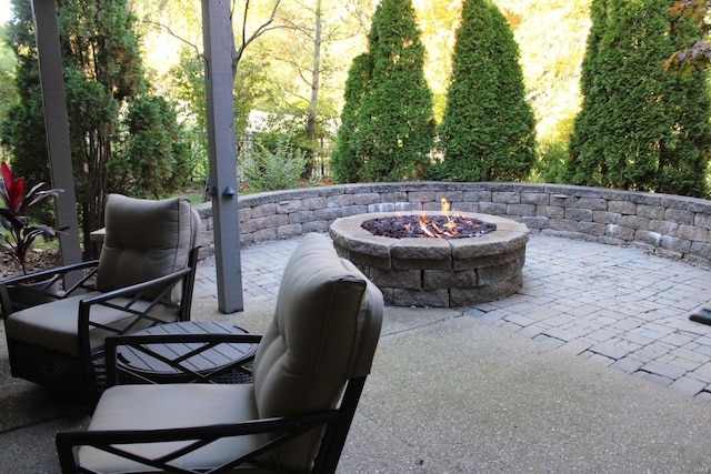 view of patio / terrace with a fire pit