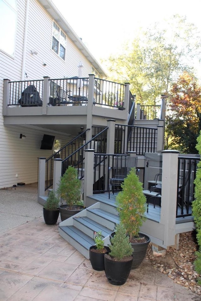 rear view of property featuring a patio