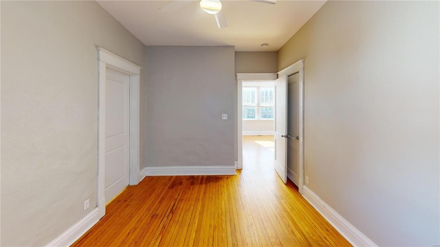 hall with light hardwood / wood-style floors