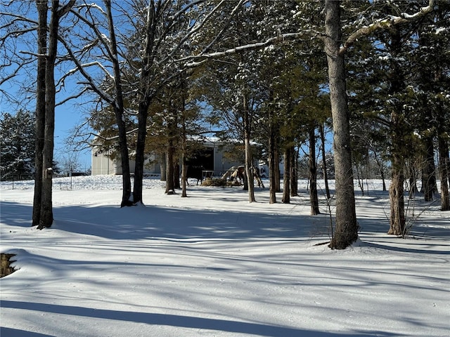 view of yard covered in snow