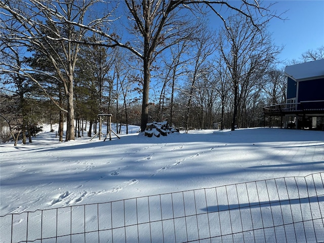 view of yard layered in snow