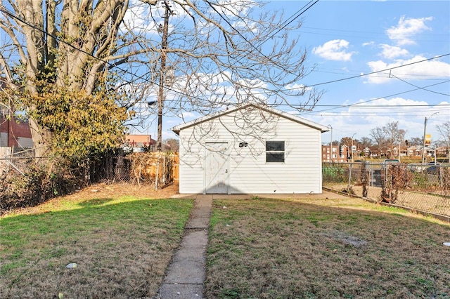 view of outdoor structure featuring a yard