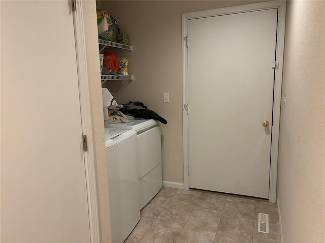 laundry area featuring washer and dryer