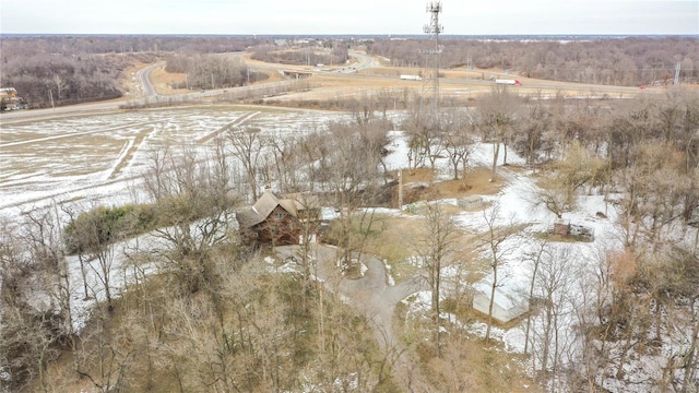 birds eye view of property with a rural view