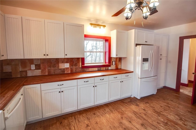 kitchen with white cabinetry, white appliances, light hardwood / wood-style floors, and butcher block countertops