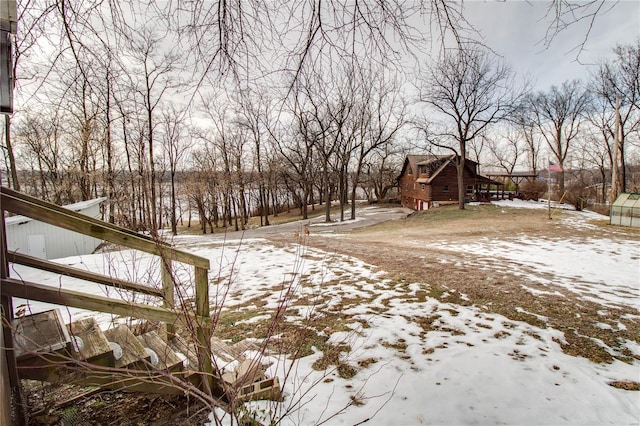 view of snowy yard