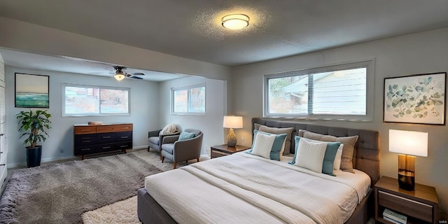 carpeted bedroom with a textured ceiling