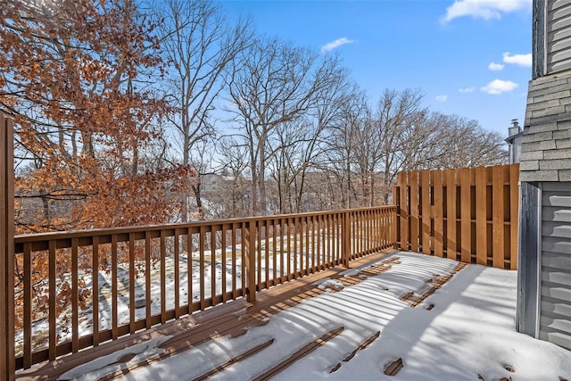 view of snow covered deck