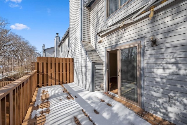 view of snow covered deck