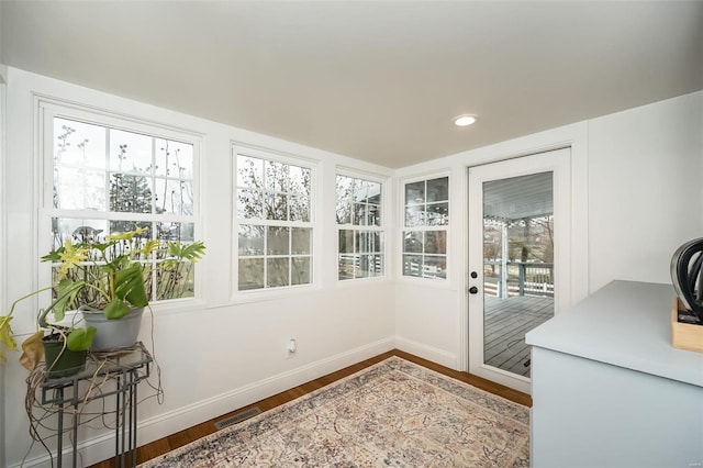 doorway to outside featuring hardwood / wood-style floors