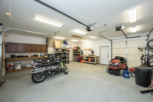 garage featuring a garage door opener