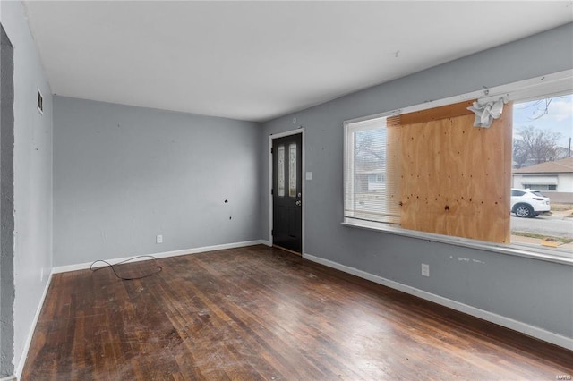 entrance foyer featuring dark hardwood / wood-style flooring