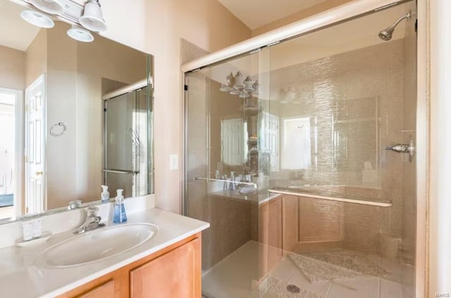 bathroom with vanity and an enclosed shower