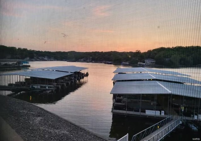 dock area featuring a water view