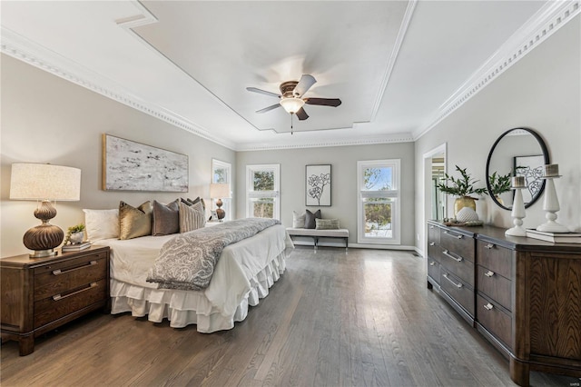 bedroom with crown molding, dark hardwood / wood-style floors, and ceiling fan