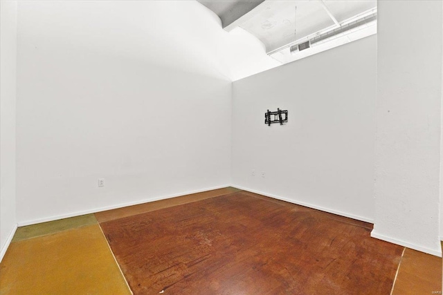 empty room featuring hardwood / wood-style flooring