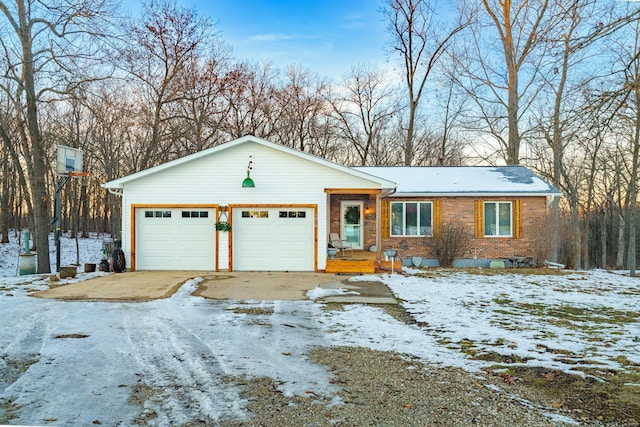 single story home with a garage