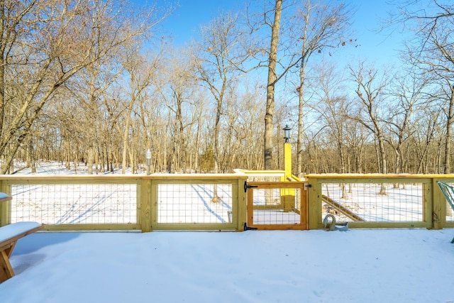 view of snow covered deck