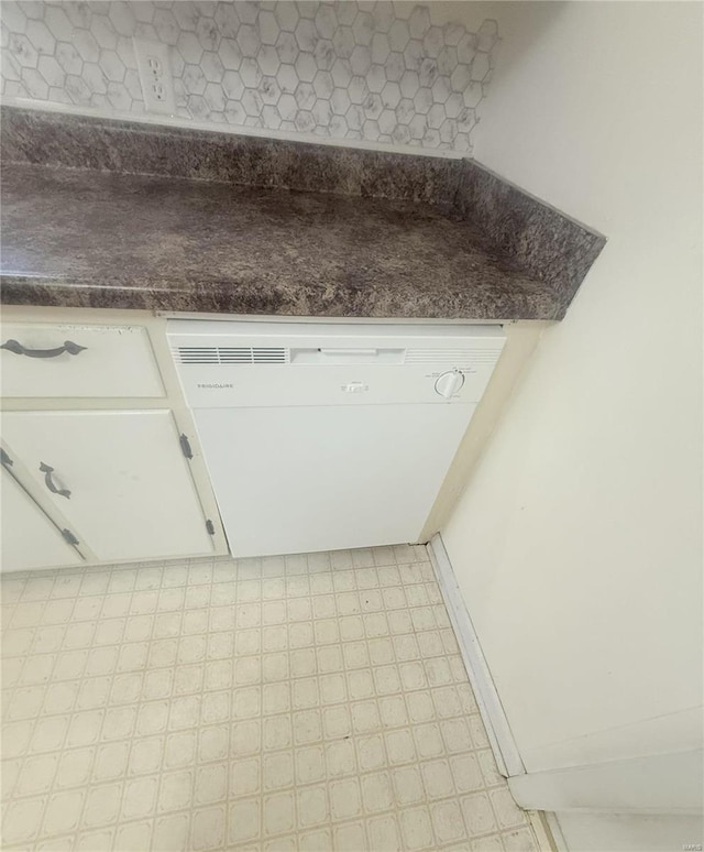 details with white cabinets and dishwasher