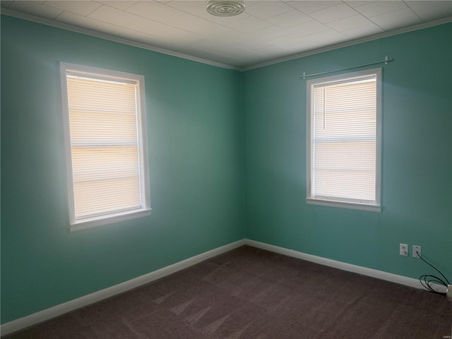 carpeted empty room with ornamental molding