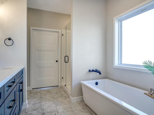 bathroom with vanity and plus walk in shower