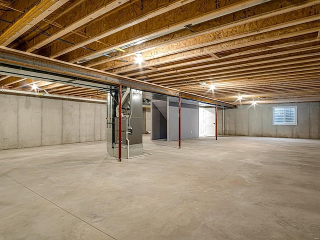 basement featuring heating unit