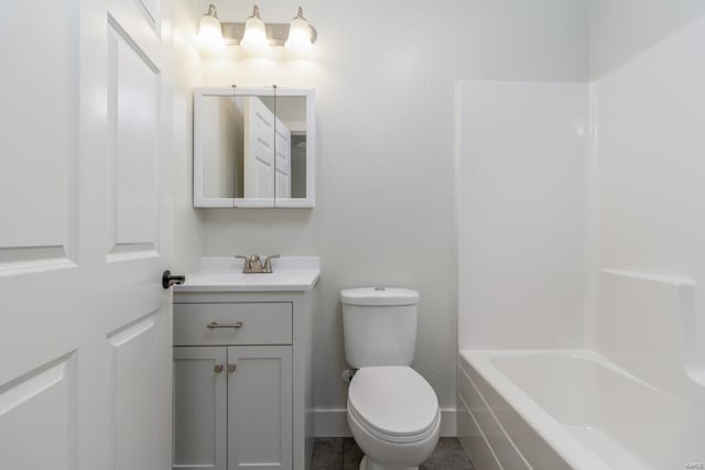 bathroom featuring toilet and vanity