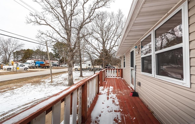 view of snow covered deck