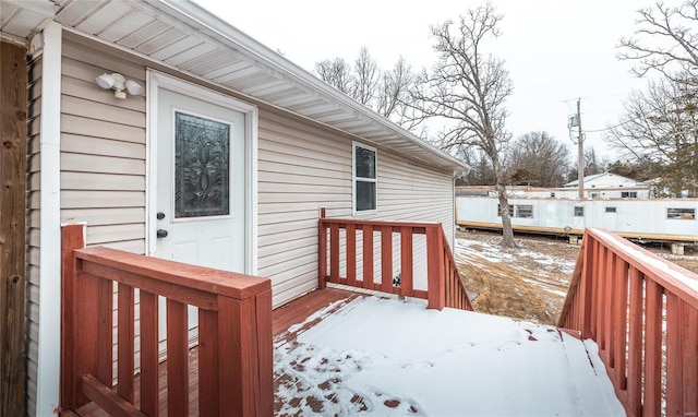 view of snow covered deck