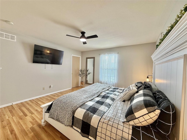 bedroom featuring ceiling fan and light wood-type flooring