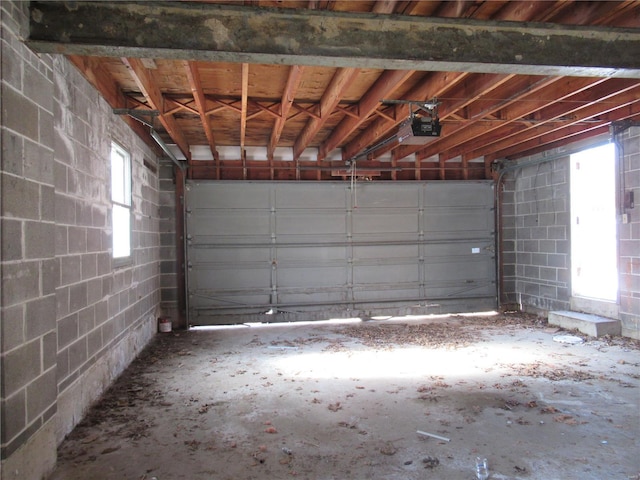 garage featuring a garage door opener