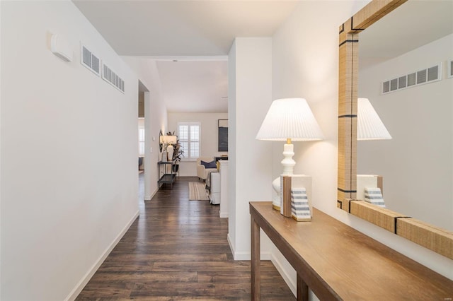 hallway featuring dark hardwood / wood-style floors