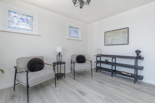 sitting room with light hardwood / wood-style floors