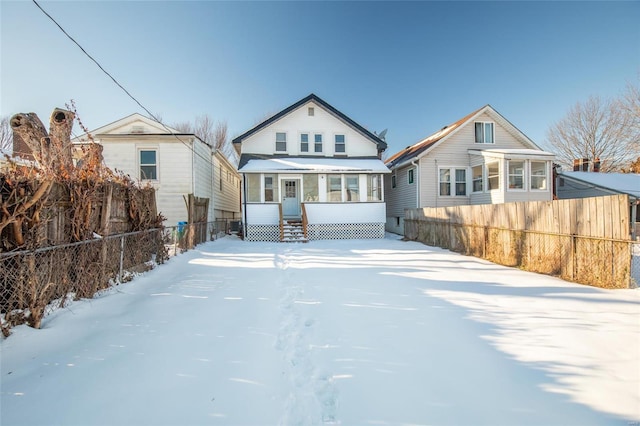 view of snow covered property