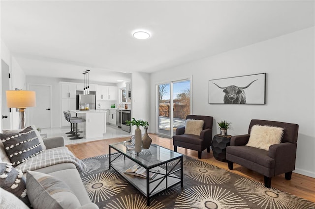 living room with light hardwood / wood-style floors