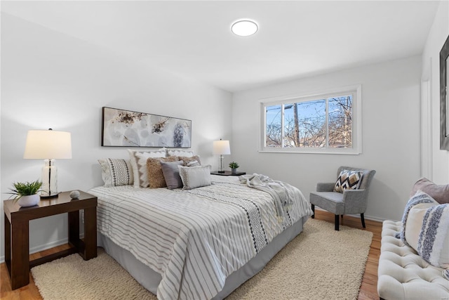 bedroom featuring hardwood / wood-style floors