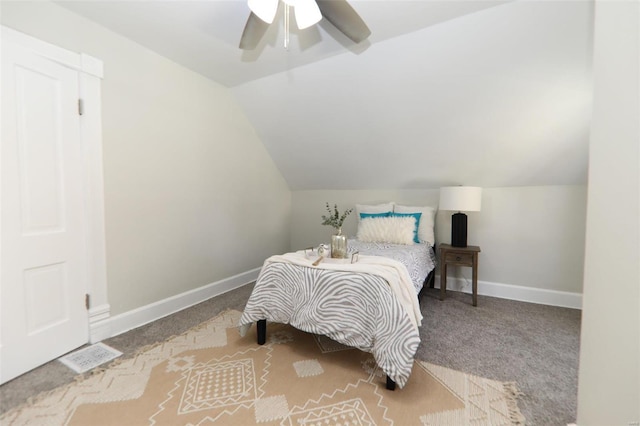 bedroom with lofted ceiling, carpet flooring, and ceiling fan