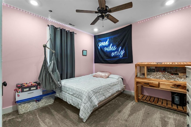 carpeted bedroom featuring ceiling fan