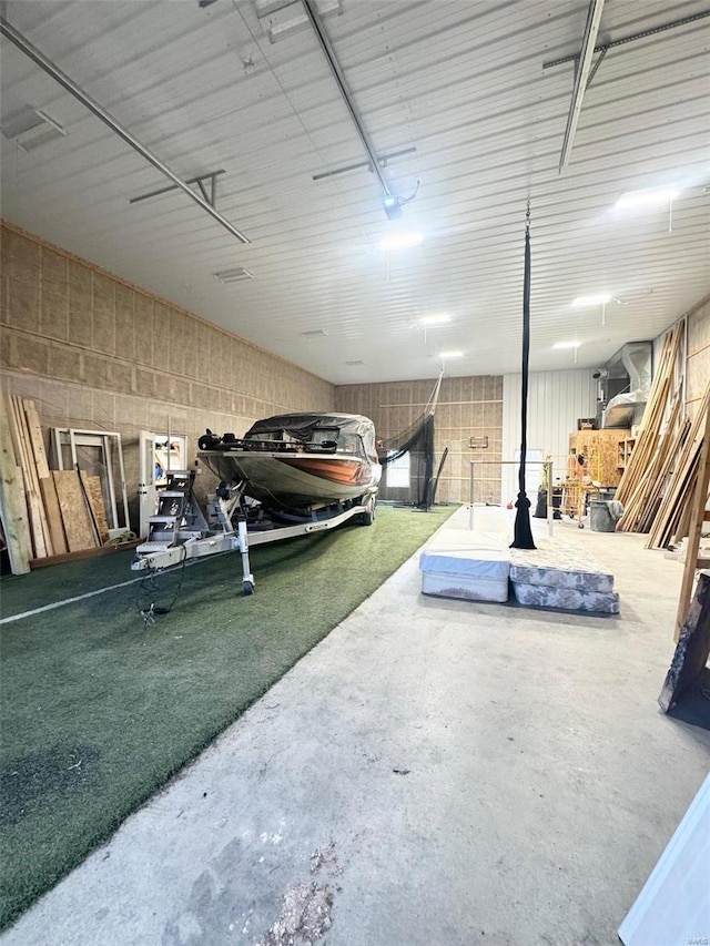 garage featuring a yard