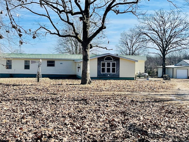 view of property exterior featuring a garage