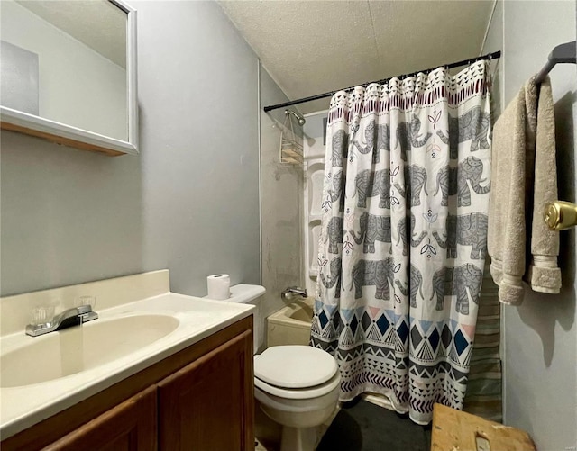 full bathroom with vanity, toilet, shower / tub combo, and a textured ceiling