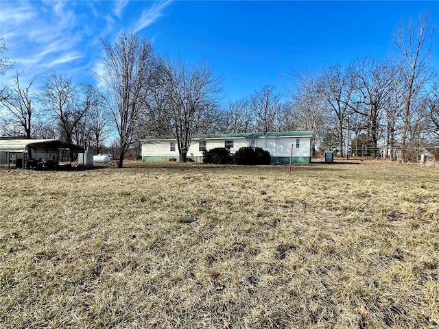 view of yard featuring a carport