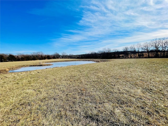 view of yard with a water view