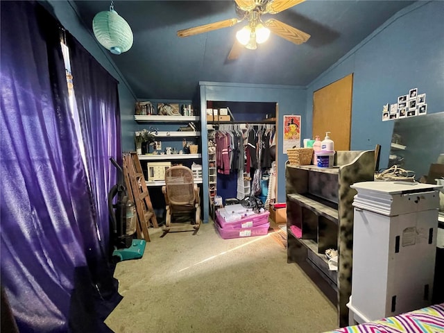 interior space with a ceiling fan, carpet, and crown molding